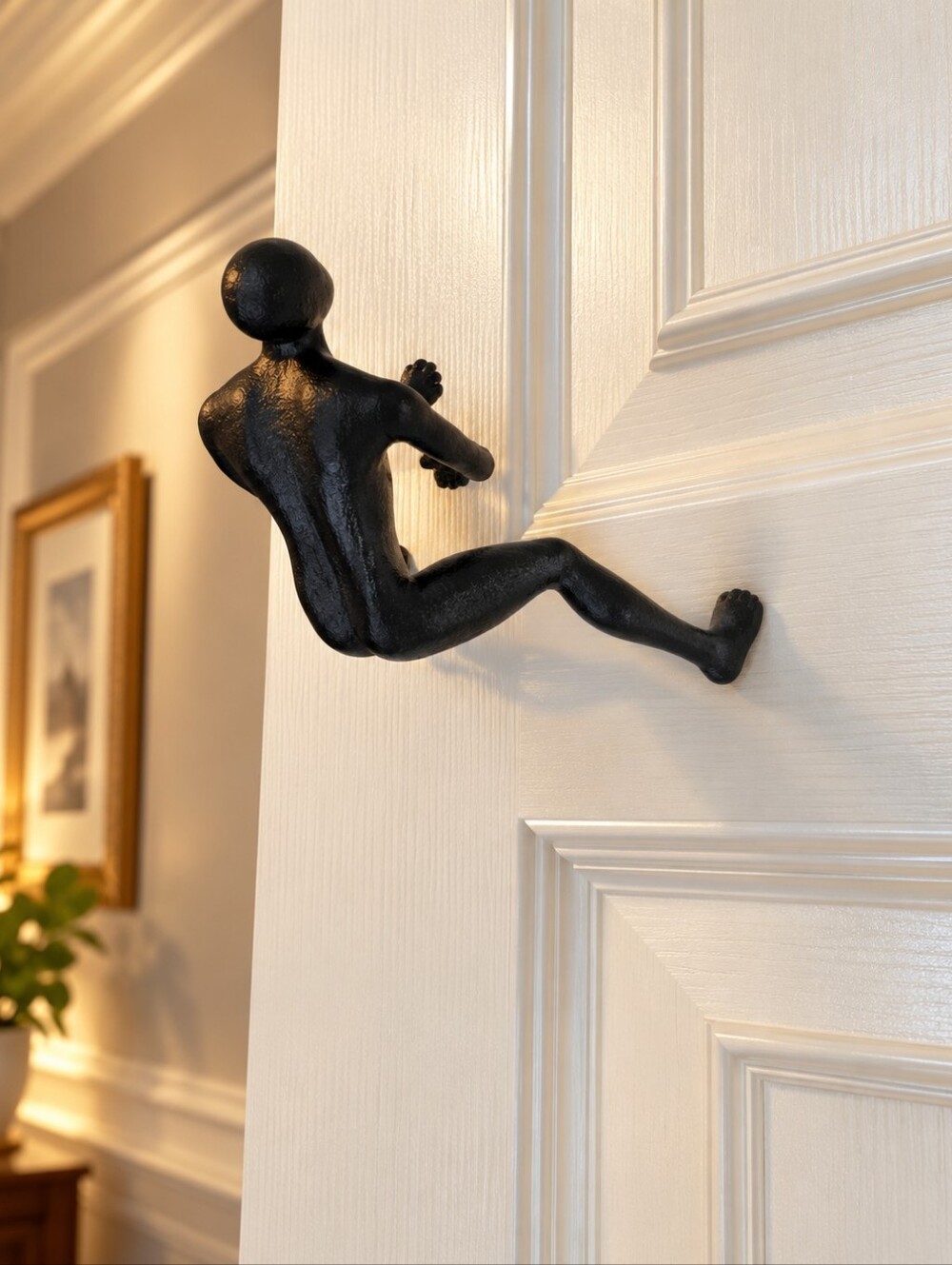 Bronze-Tone “Repeller” Wall Sculpture – Quirky Climbing Figure